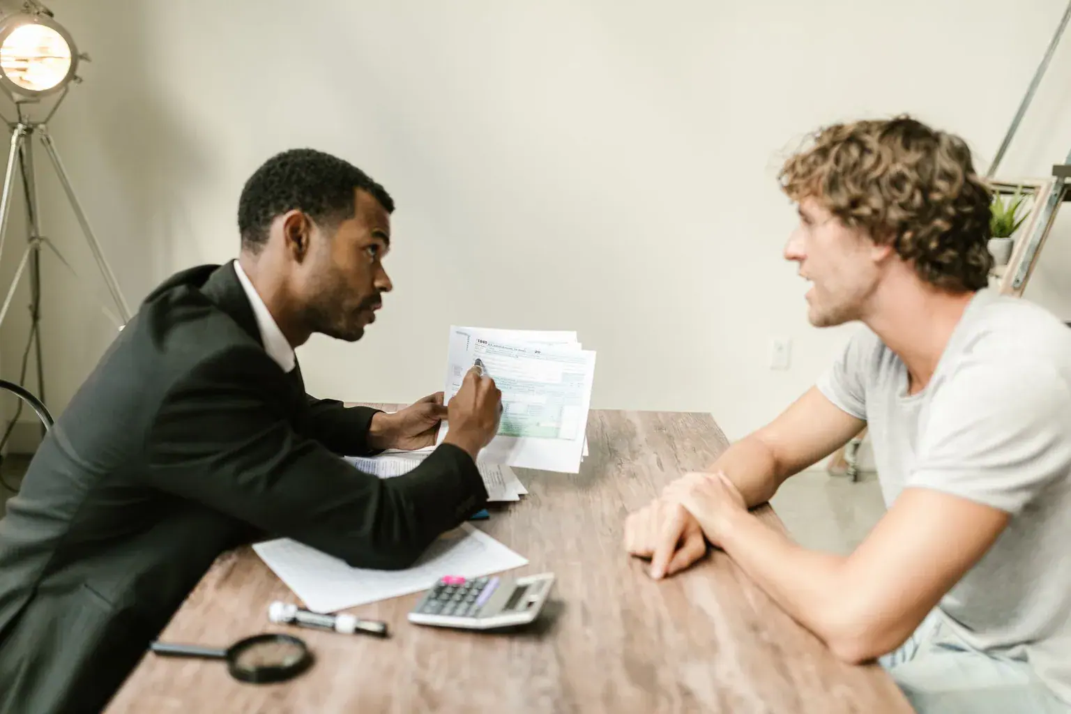 An advisor reviewing documents with a client