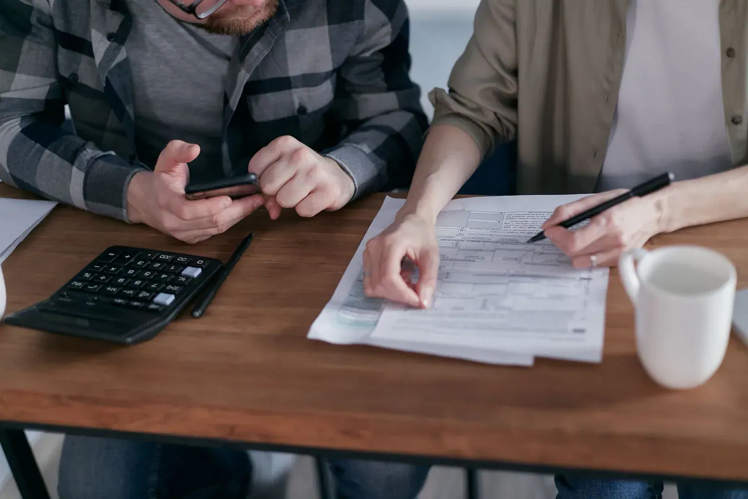 A couple planning their finances at home